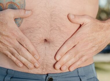A Person Holding his Stomach